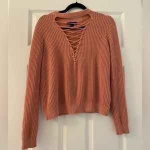 Cute, light pink sweater for girls ages 9-13 with beautiful V neck